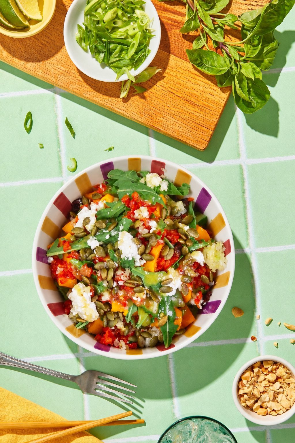 A colourful roasted-vegetable and pepita grain bowl